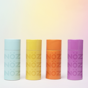 Front view of Nöz’s cool natural reef safe sunscreen in four different colors 